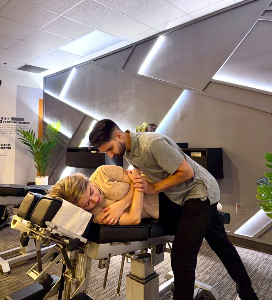 Chiropractor Dr. Herx adjusting a patient